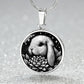 Elegant silver pendant Water Lily Bunny necklace. Colors are silver with a black background. This jewelry offers personalization with an engraving option for a name.