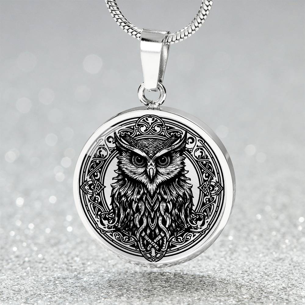 an Elegant silver pendant Celtic Owl necklace featuring a vivid Celtic black owl inside a circle frame with a silver backdrop. This jewelry offers personalization with an engraving option for a name.