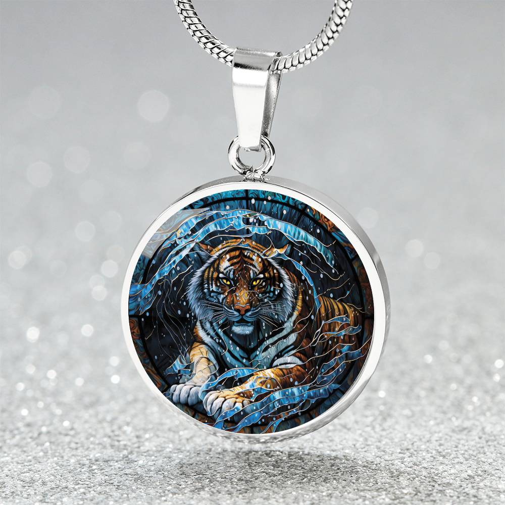 An elegant silver pendant Chinese Zodiac Tiger Necklace. The colors are blue, black, orange, white and yellow. This jewelry offers personalization with an engraving option for a name.