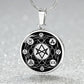 an Elegant silver Hexagram Gothic Necklace with the symbols Earth, Fire, Water, Air, God, Goddess, Unicursal, Triskelion and Triquetra, in Black/Silver backdrop. This jewelry offers personalization with an engraving option for a name.