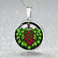 Elegant silver pendant necklace featuring a vivid Mistletoe with red berries set against a silver & black backdrop. This necklace offers personalization with an engraving option for a name.