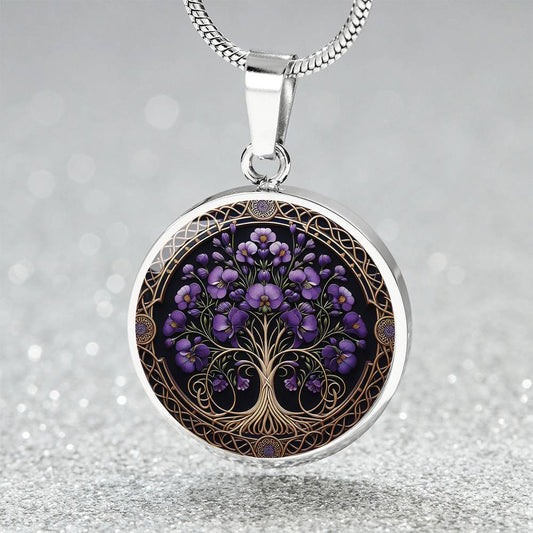 an elegant silver pendant Larkspur Tree of Life Necklace. The Colors are purple, green and brown. This jewelry offers personalization with an engraving option for a name.