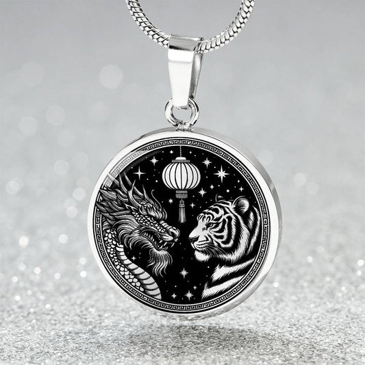 An Elegant silver pendant featuring a Year of the Tiger and Year of The Dragon Necklace in silver and black. This jewelry offers personalization with an engraving option for a name.