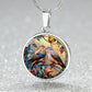 Elegant silver pendant necklace featuring two turtle doves, set against a subtle tan backdrop. This jewelry offers personalization with an engraving option for a name.