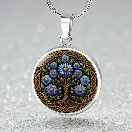 an elegant silver pendant Aster Celtic Tree of Life Necklace. The Colors are blue, green, brown and black. This jewelry offers personalization with an engraving option for a name.