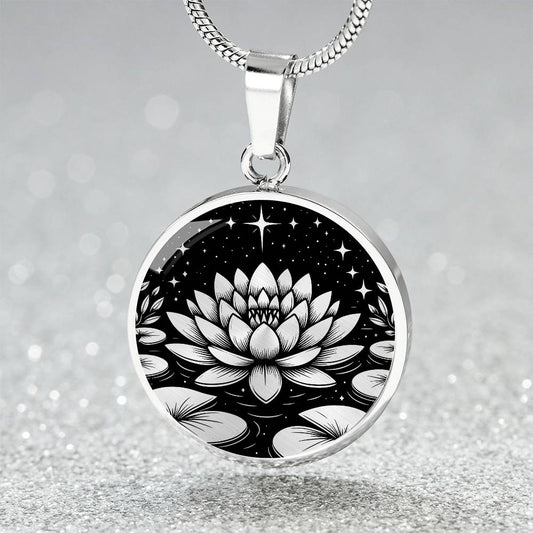 An Elegant silver pendant Water Lily Necklace featuring Stars, Lily Pads and a Water lily, all in black and silver. This jewelry offers personalization with an engraving option for a name.