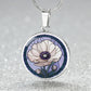 an Elegant silver pendant Anemone Necklace. The Colors are Purple Gray, Dark Green. This jewelry offers personalization with an engraving option for a name.