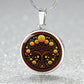 an elegant silver pendant Marigold Celtic Tree of Life Necklace. The Colors are yellow, green, brown and black. This jewelry offers personalization with an engraving option for a name.