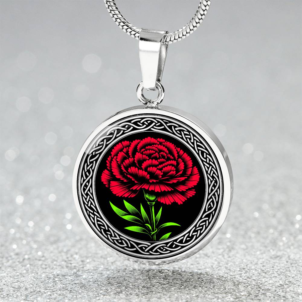 an Elegant January Silver pendant Celtic Carnation Birth Flower necklace featuring a vivid red, green flower, set against a Silver & black backdrop. This jewelry offers personalization with an engraving option for a name.