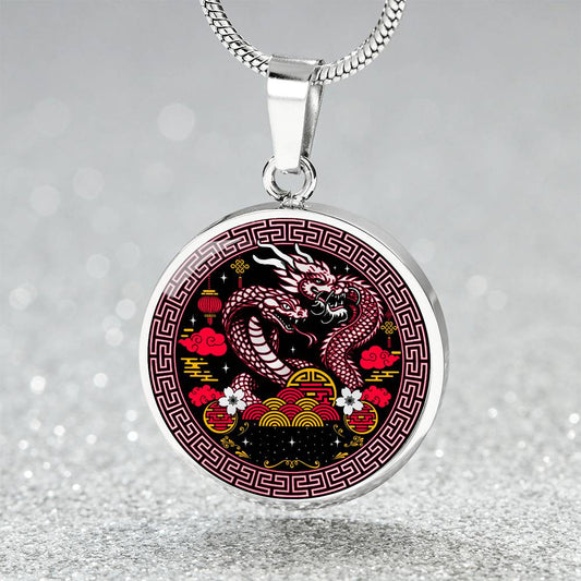 An Elegant silver pendant featuring a Year of the Snake and Year of The Dragon Necklace in red, yellow, silver and black. This jewelry offers personalization with an engraving option for a name.