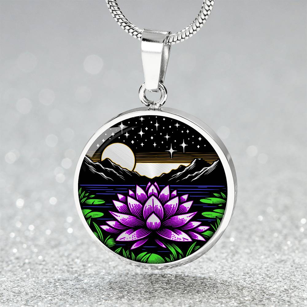 An Elegant silver pendant Water Lily Necklace featuring Mountains, Stars, Yellow outline Sun, Green grass Lily Pads, Blue Water, Pink lily, black and silver Background. This jewelry offers personalization with an engraving option for a name.