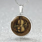 An elegant silver pendant Violet Necklace. The colors are brown, black and tan. This jewelry offers personalization with an engraving option for a name.