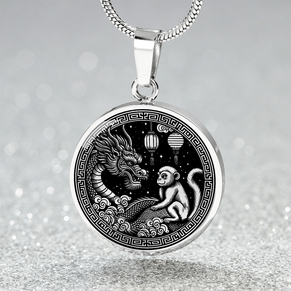 An Elegant silver pendant featuring a Year of the Monkey and Year of The Dragon Necklace in silver and black. This jewelry offers personalization with an engraving option for a name.