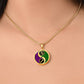 Woman wearing an elegant gold pendant Zodiac Necklace. This jewelry offers personalization with an engraving option for a name.