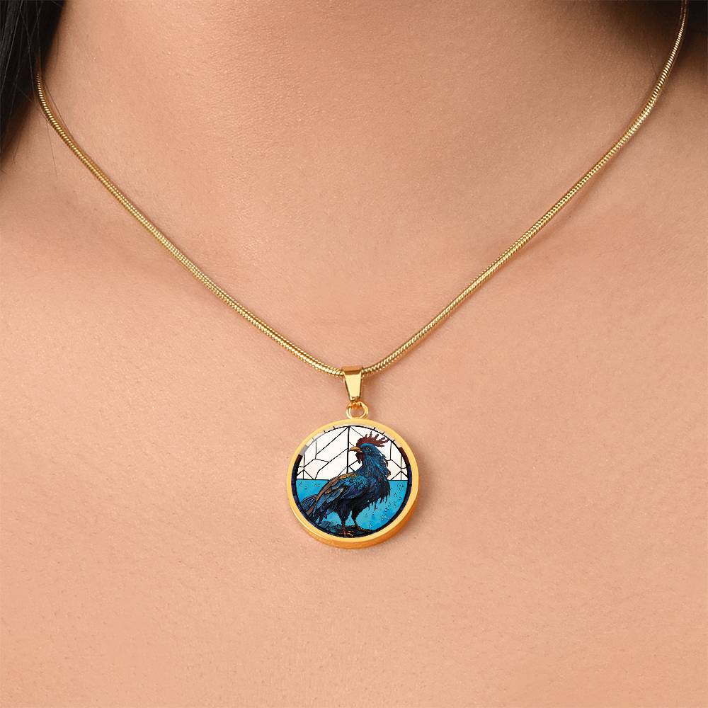 Woman wearing an Elegant gold pendant featuring a Chinese Zodiac Rooster Necklace. The colors are blue, white, tan, red, yellow, brown. This jewelry offers personalization with an engraving option for a name.