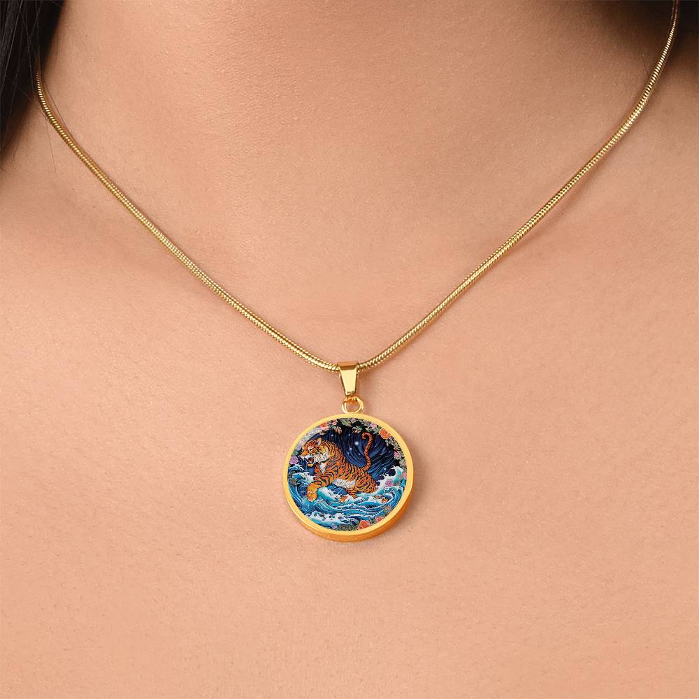 Woman wearing an elegant gold pendant Chinese Zodiac Tiger Necklace. The colors are blue, black, green, orange, white, pink, purple and red. This jewelry offers personalization with an engraving option for a name.