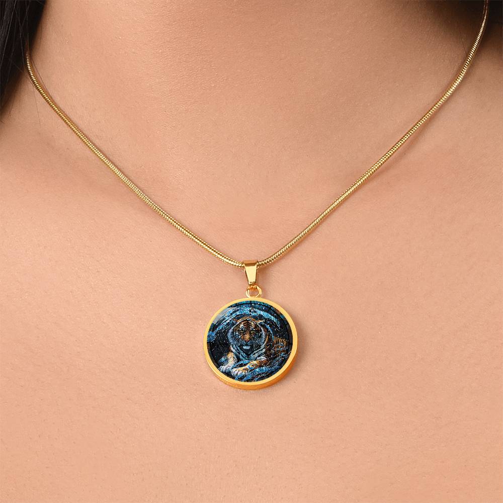 Woman wearing an elegant gold pendant Chinese Zodiac Tiger Necklace. The colors are blue, black, orange, white and yellow. This jewelry offers personalization with an engraving option for a name.