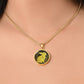 Woman wearing an Elegant gold pendant Rabbit Necklace. Yellow Rabbit and Flowers with a black and brown backdrop. This jewelry offers personalization with an engraving option for a name.