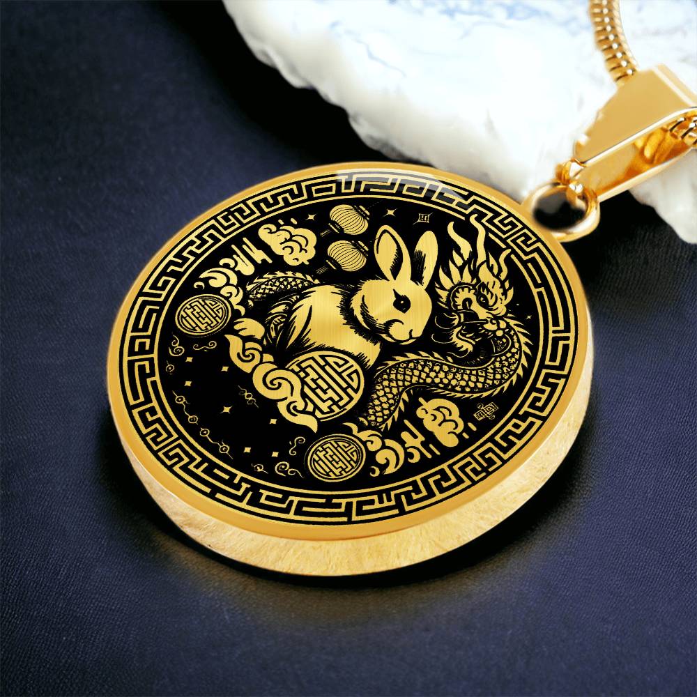 This Year of the dragon necklace. Elegant gold pendant with a rabbit & dragon, is set against a gold backdrop. This jewelry offers personalization with an engraving option for a name.