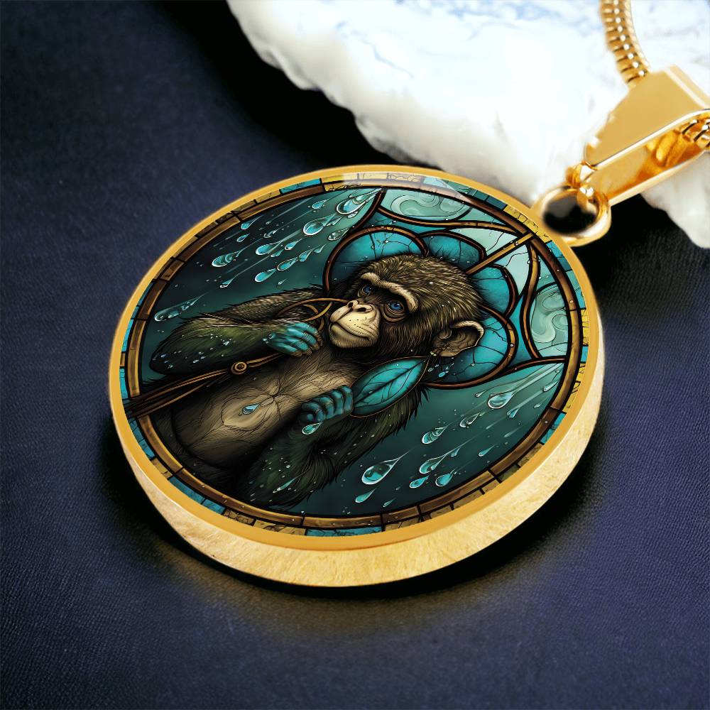 An elegant gold pendant Chinese Zodiac Monkey Necklace. The colors are yellow, blue, teal, brown and green. This jewelry offers personalization with an engraving option for a name.