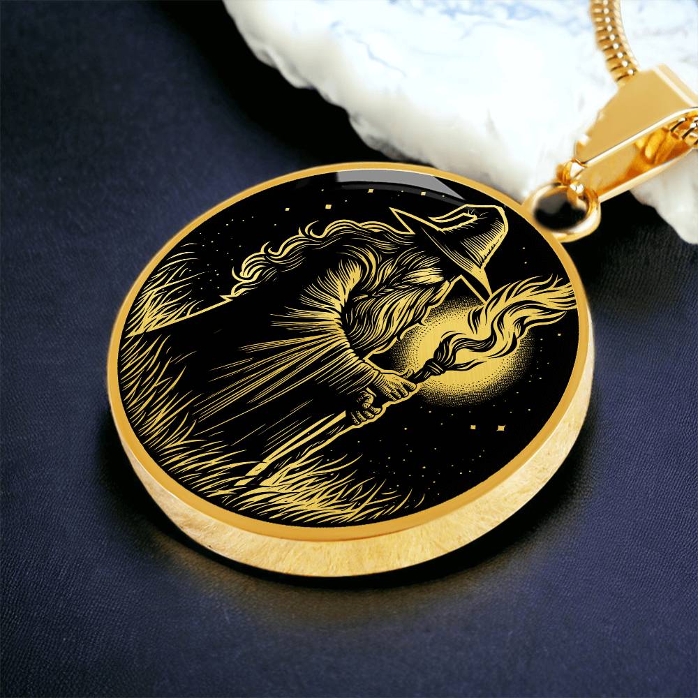 An Elegant gold pendant featuring a Fantasy Wizard Necklace in gold and black. This jewelry offers personalization with an engraving option for a name.