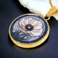 an Elegant gold pendant Anemone Necklace. The Colors are Purple Gray, Dark Green. This jewelry offers personalization with an engraving option for a name.