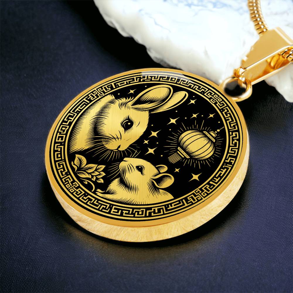 An Elegant gold pendant featuring a Year of the Rat and Year of The Rabbit Necklace in gold and black. This jewelry offers personalization with an engraving option for a name.