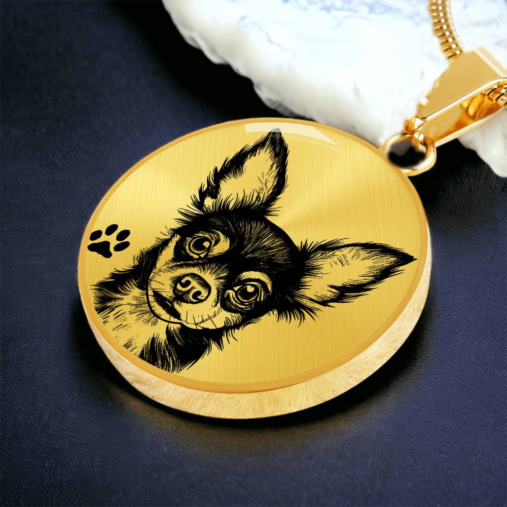 An Elegant gold pendant Chihuahua Dog Necklace. The Chihuahua Design is in Gold and Black with a black paw print. This jewelry offers personalization with an engraving option for a name.