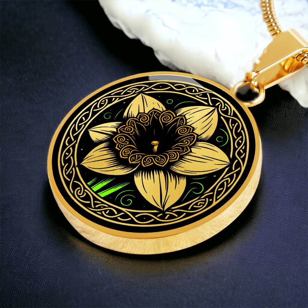 Elegant gold pendant featuring a vivid Yellow Daffodil Birth Flower Necklace, March birth month flower, set against a Green & Black backdrop with a Celtic border. Personalization with an engraving option for a name.