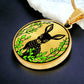 An Elegant gold pendant Deer Necklace. All in gold and black with green leaves. This jewelry offers personalization with an engraving option for a name.