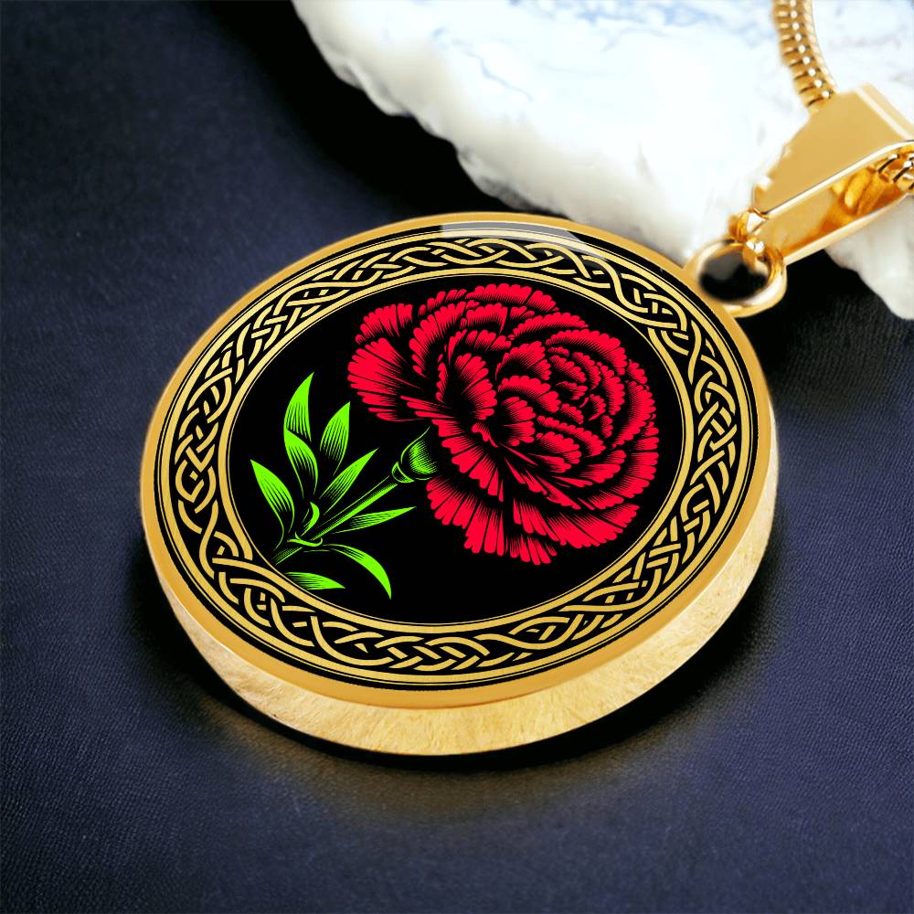 Elegant January gold pendant Celtic Carnation Birth Flower necklace featuring a vivid red, green flower, set against a gold & black backdrop. This jewelry offers personalization with an engraving option for a name.