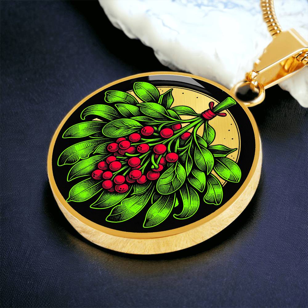 Elegant gold pendant necklace featuring a vivid Mistletoe with red berries set against a gold & black backdrop. This necklace offers personalization with an engraving option for a name.