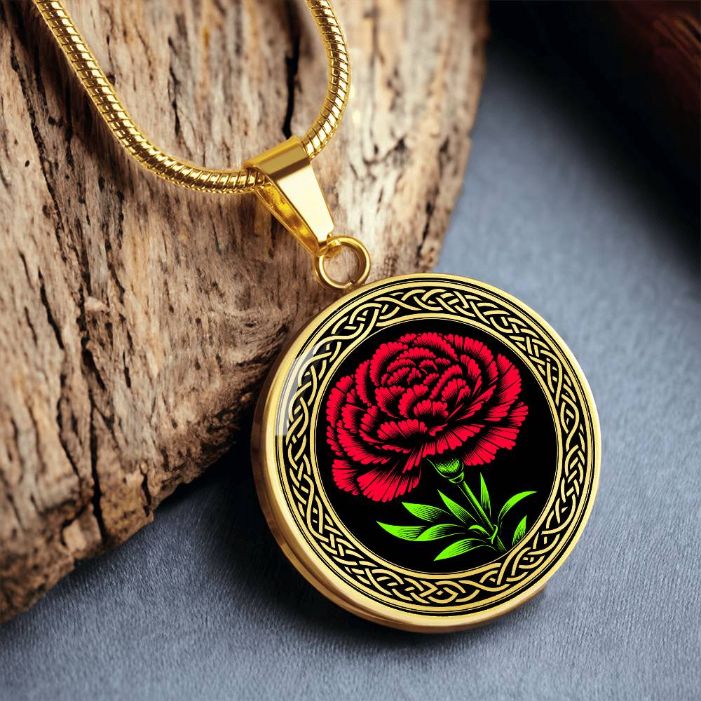 Elegant January gold pendant Celtic Carnation Birth Flower necklace featuring a vivid red, green flower, set against a gold & black backdrop. This jewelry offers personalization with an engraving option for a name.