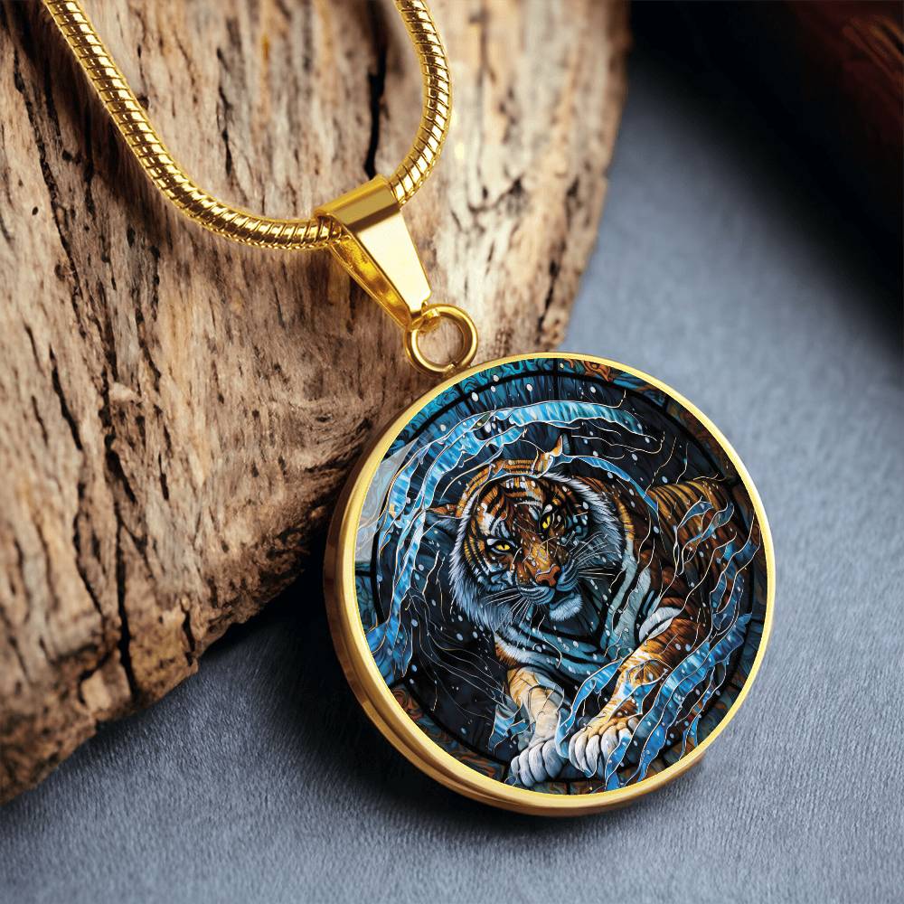 An elegant gold pendant Chinese Zodiac Tiger Necklace. The colors are blue, black, orange, white and yellow. This jewelry offers personalization with an engraving option for a name.