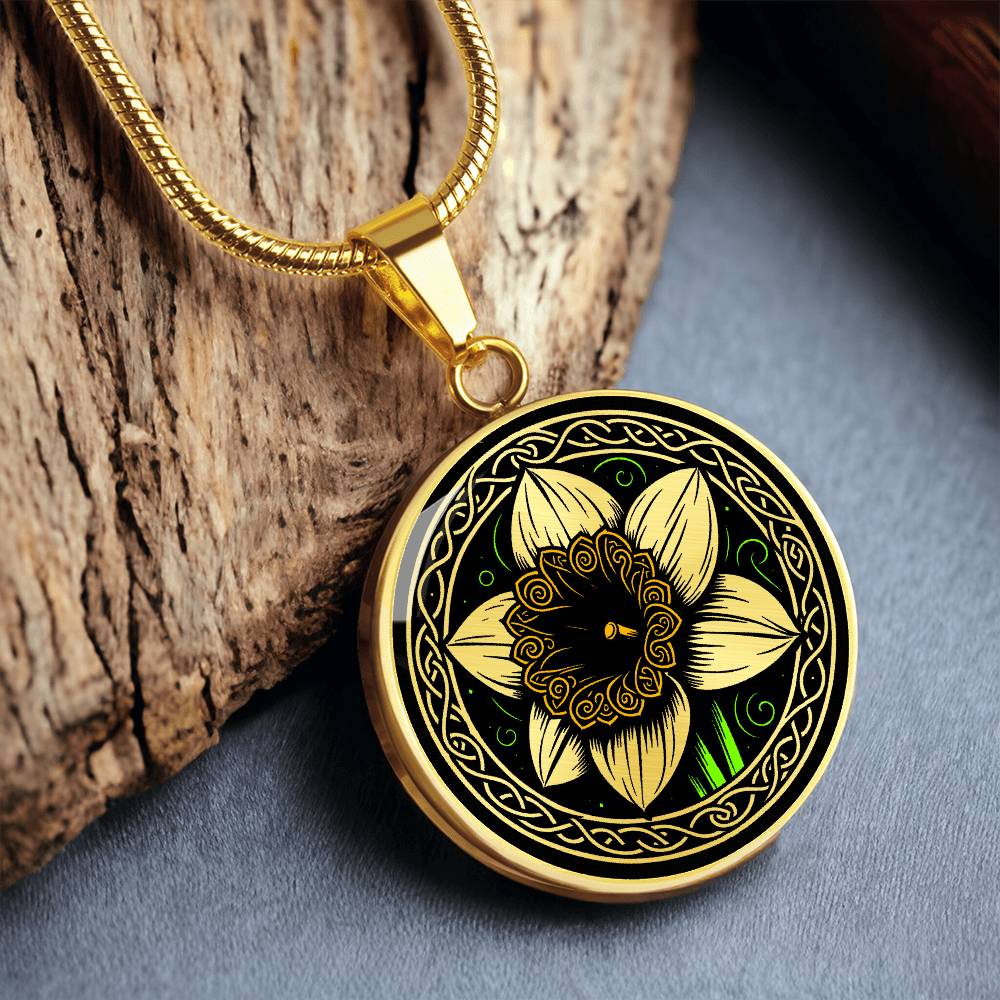 Elegant gold pendant featuring a vivid Yellow Daffodil Birth Flower Necklace, March birth month flower, set against a Green & Black backdrop with a Celtic border. Personalization with an engraving option for a name.