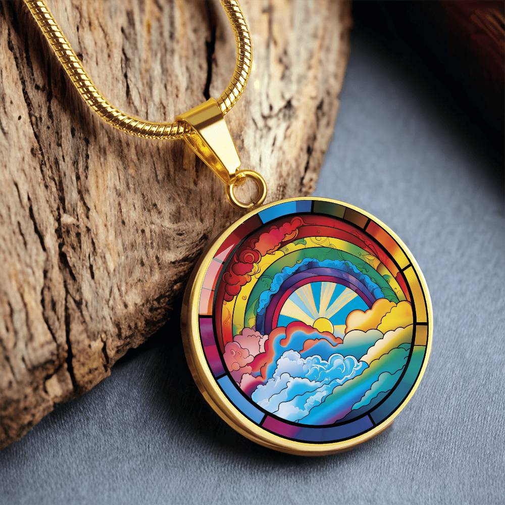 an elegant gold pendant Lucky Rainbow Necklace. The colors are all the colors of the rainbow. This jewelry offers personalization with an engraving option for a name.