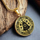 Elegant gold pendant necklace featuring a Winter Christmas theme with a Tree set against a gold backdrop. This necklace offers personalization with an engraving option for a name.