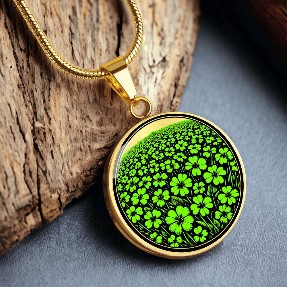 Elegant gold pendant necklace featuring a vivid Green Clover Field set against a Gold & black backdrop. This necklace offers personalization with an engraving option for a name.