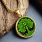 Elegant Gold pendant featuring a vivid Green Celtic four leaf Clover Tree of Life Necklace, set against a Black & gold backdrop. This jewelry offers personalization with an engraving option for a name.