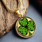 Elegant gold pendant necklace featuring a vivid Green Celtic Clover set against a Gold & black backdrop. This necklace offers personalization with an engraving option for a name.