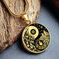 An Elegant gold pendant featuring a vivid Gold Fire, Water, snowflakes and Icebergs. set against a Black backdrop. This jewelry offers personalization with an engraving option for a name.