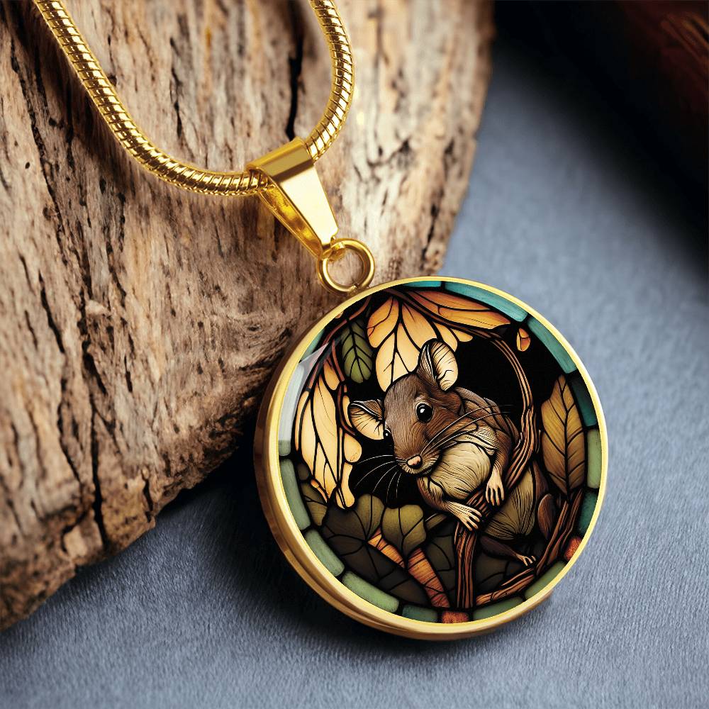 an Elegant gold pendant Rat necklace. Brown Rat, Brown Twigs, yellow and green leaves, blue, orange and green border. This jewelry offers personalization with an engraving option for a name.