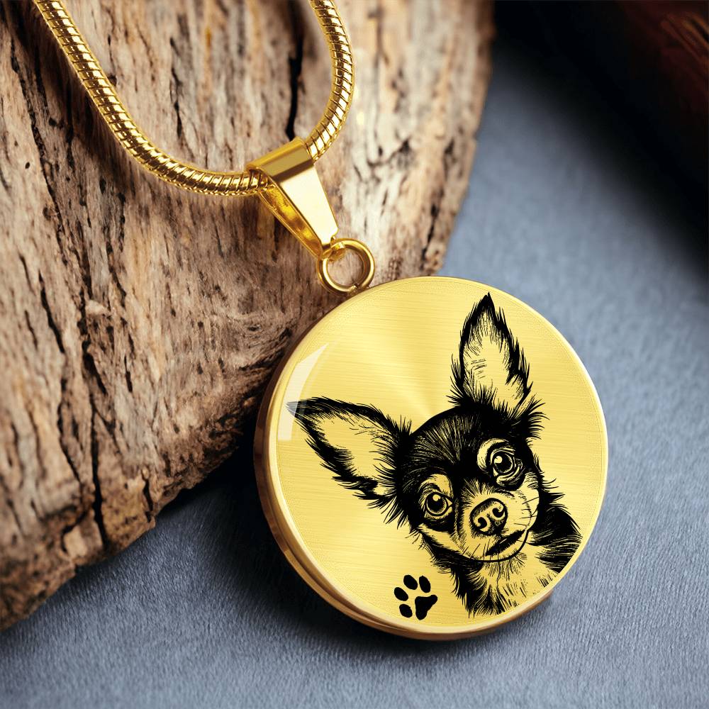 An Elegant gold pendant Chihuahua Dog Necklace. The Chihuahua Design is in Gold and Black with a black paw print. This jewelry offers personalization with an engraving option for a name.