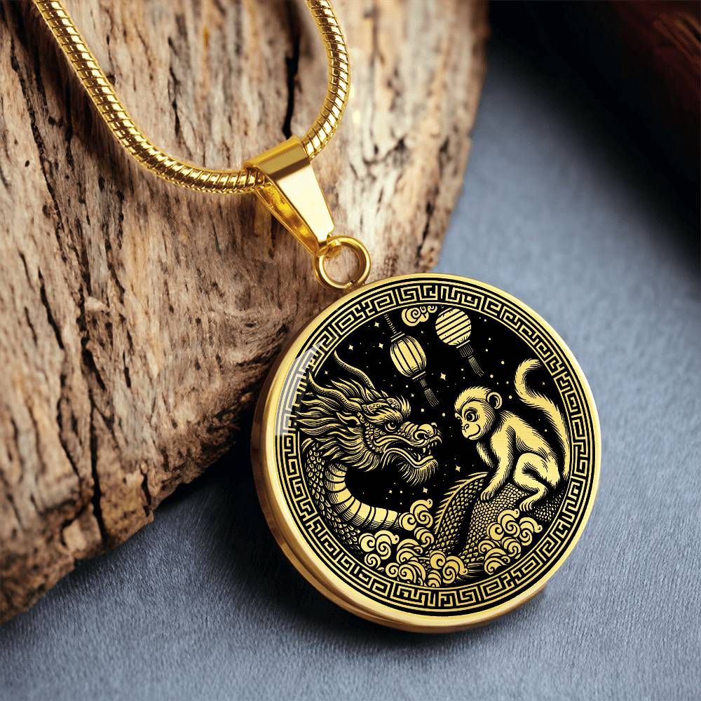 An Elegant gold pendant featuring a Year of the Monkey and Year of The Dragon Necklace in gold and black. This jewelry offers personalization with an engraving option for a name.