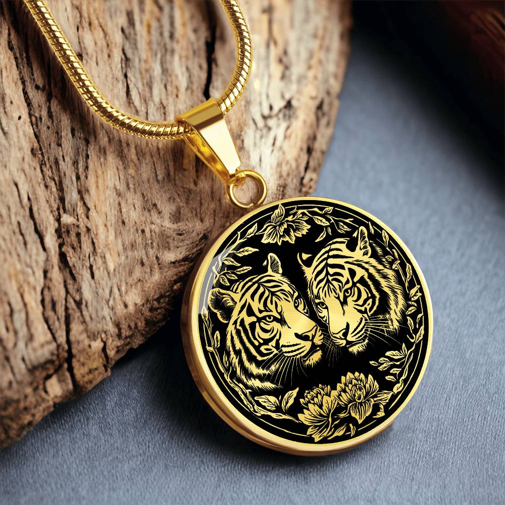 An elegant gold pendant Year of the Tiger Necklace. The colors are gold and black. This jewelry offers personalization with an engraving option for a name.