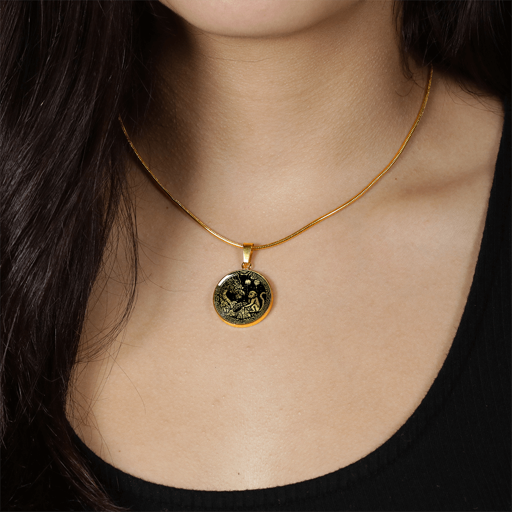 Woman wearing An Elegant gold pendant featuring a Year of the Monkey and Year of The Dragon Necklace in gold and black. This jewelry offers personalization with an engraving option for a name.