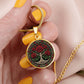 Woman holding an elegant gold pendant Rose Tree of Life Necklace. The Colors are red, green, white and black. This jewelry offers personalization with an engraving option for a name.