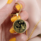 Woman holding An Elegant gold pendant featuring a Year of the Monkey and Year of The Dragon Necklace in gold and black. This jewelry offers personalization with an engraving option for a name.