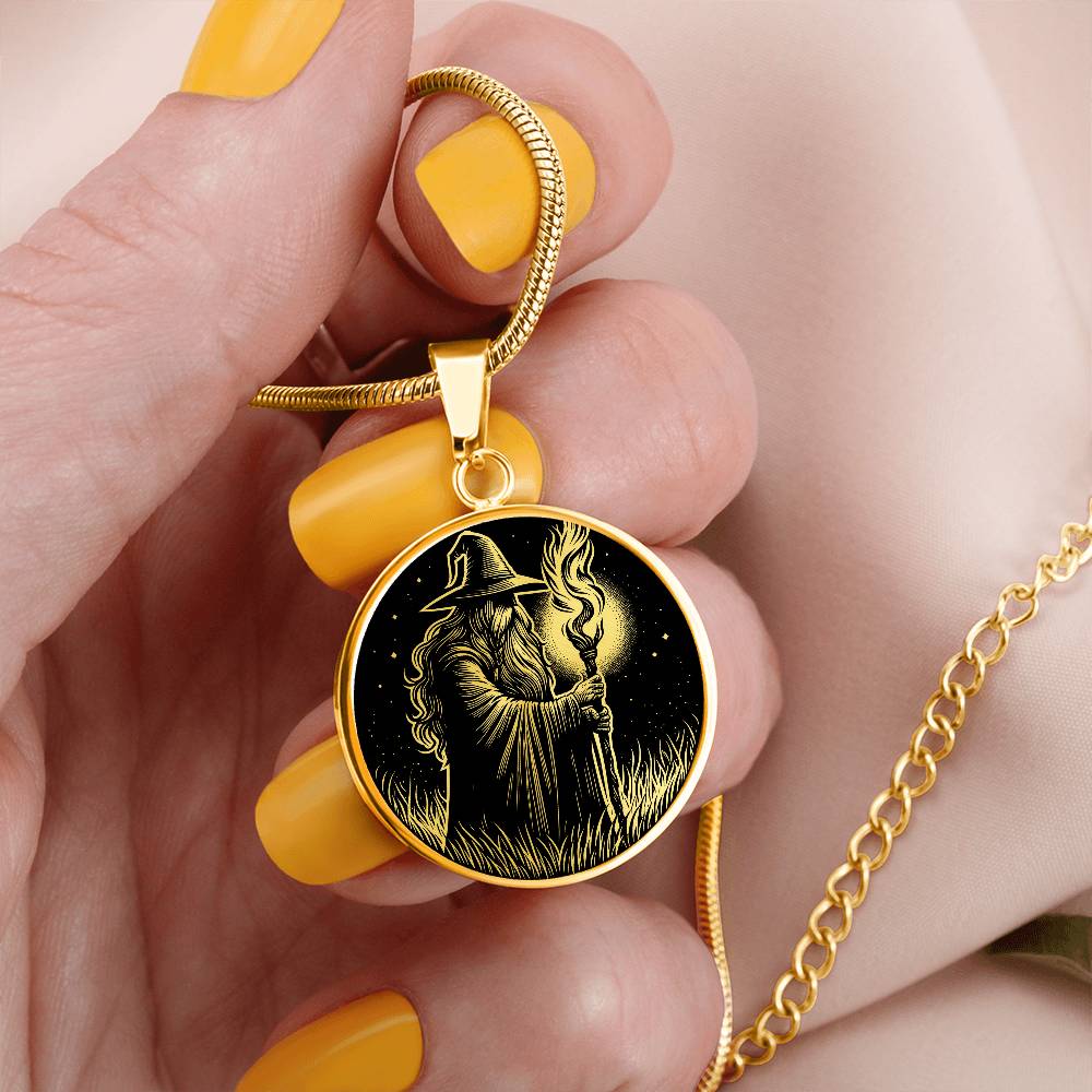 Woman holding An Elegant gold pendant featuring a Fantasy Wizard Necklace in gold and black. This jewelry offers personalization with an engraving option for a name.