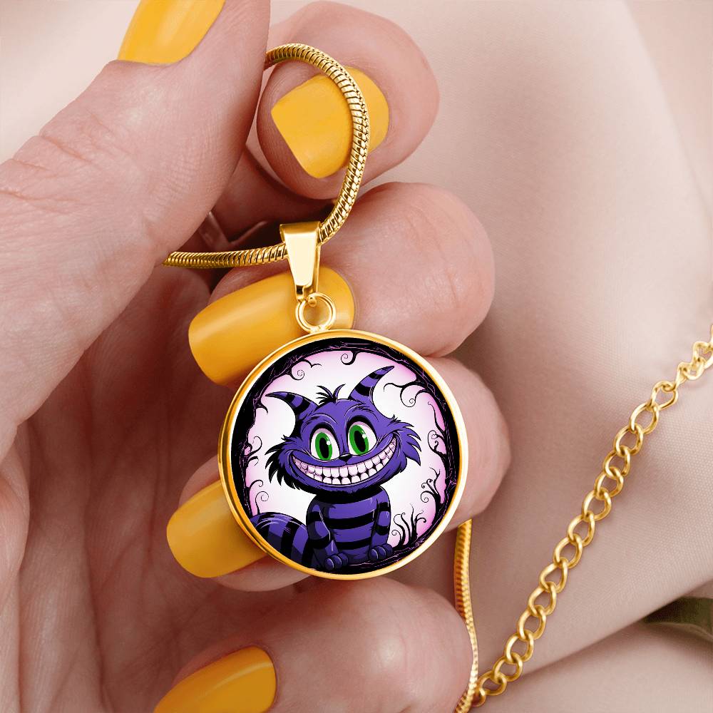 Cheshire Cat Necklace Pendant in a woman's hand